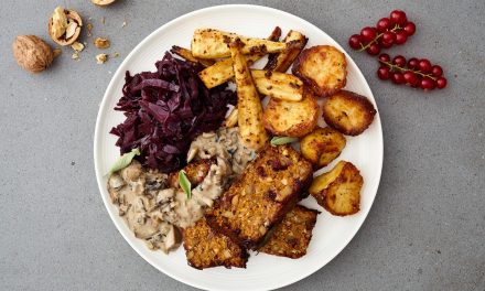 Tofoo Christmas Roast With Roast Potatoes, Parsnips And Sherry Braised Red Cabbage Served With Wild Mushroom Gravy